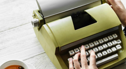 Woman using typewriter