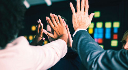 Team of Employees High Five