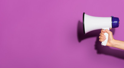 Person holding megaphone