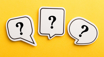 Question marks in speech bubbles