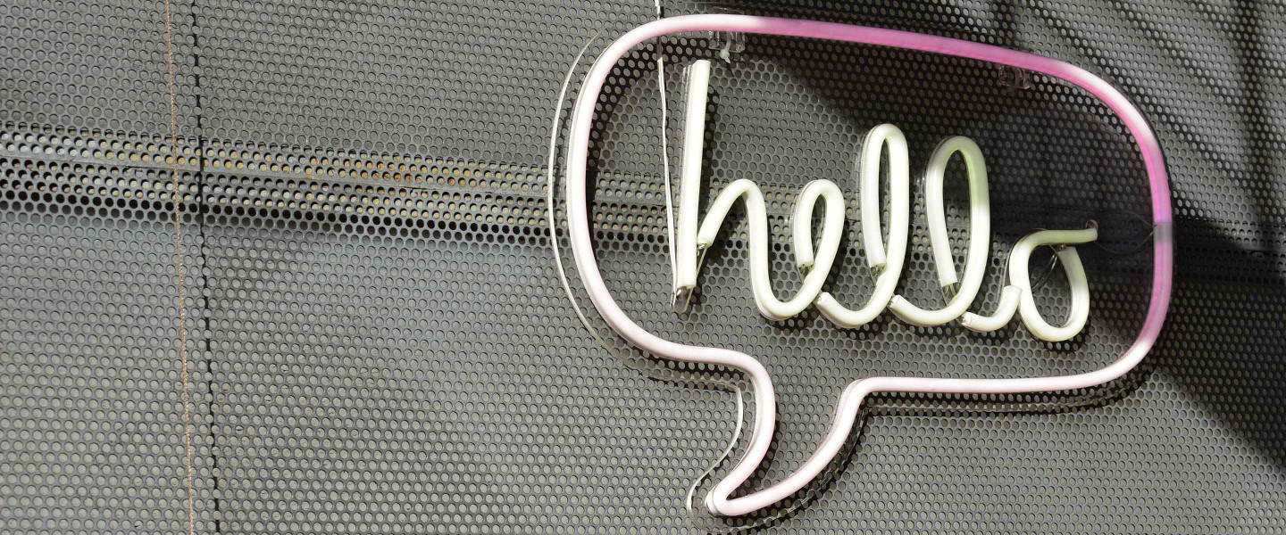 Neon Hello in Speech Bubble