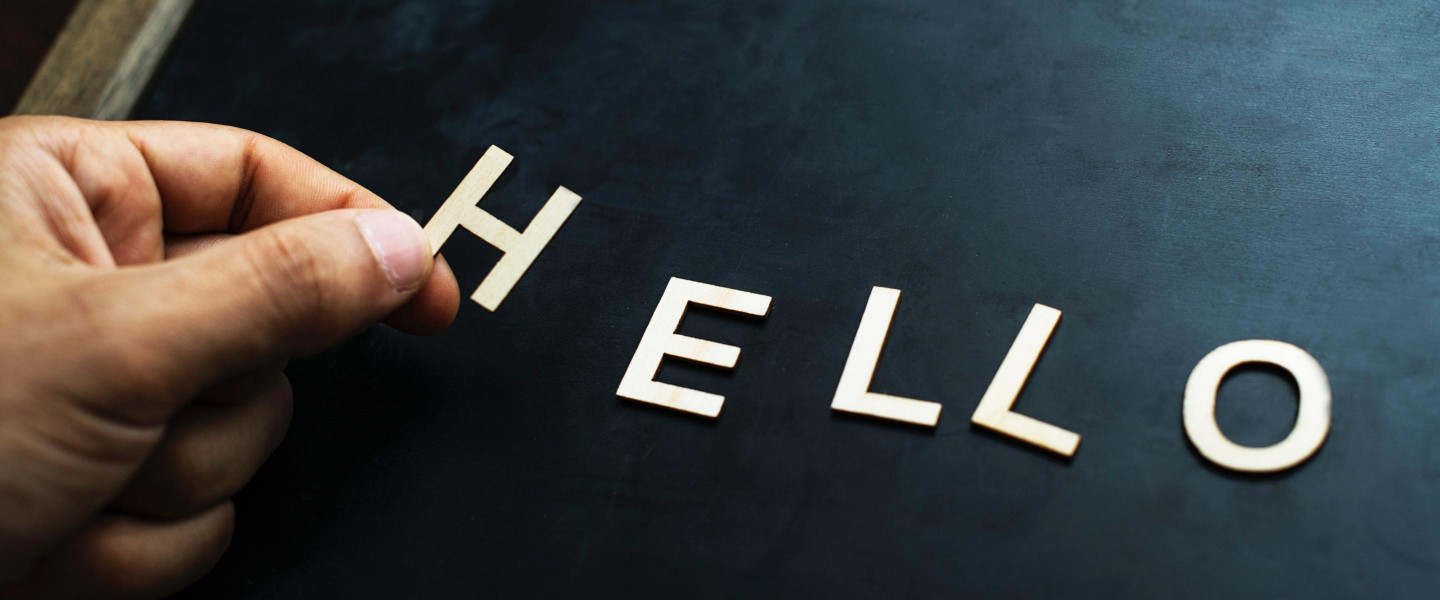 Hello letters on chalkboard
