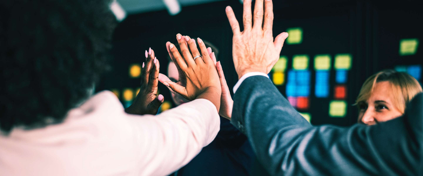 Team of Employees High Five