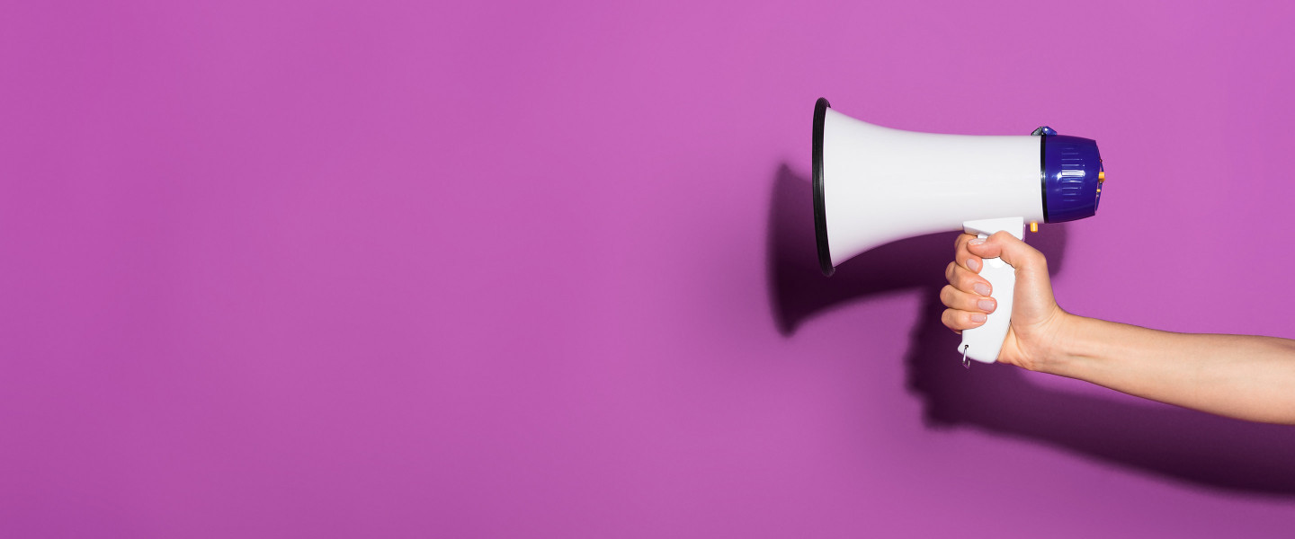 Person holding megaphone