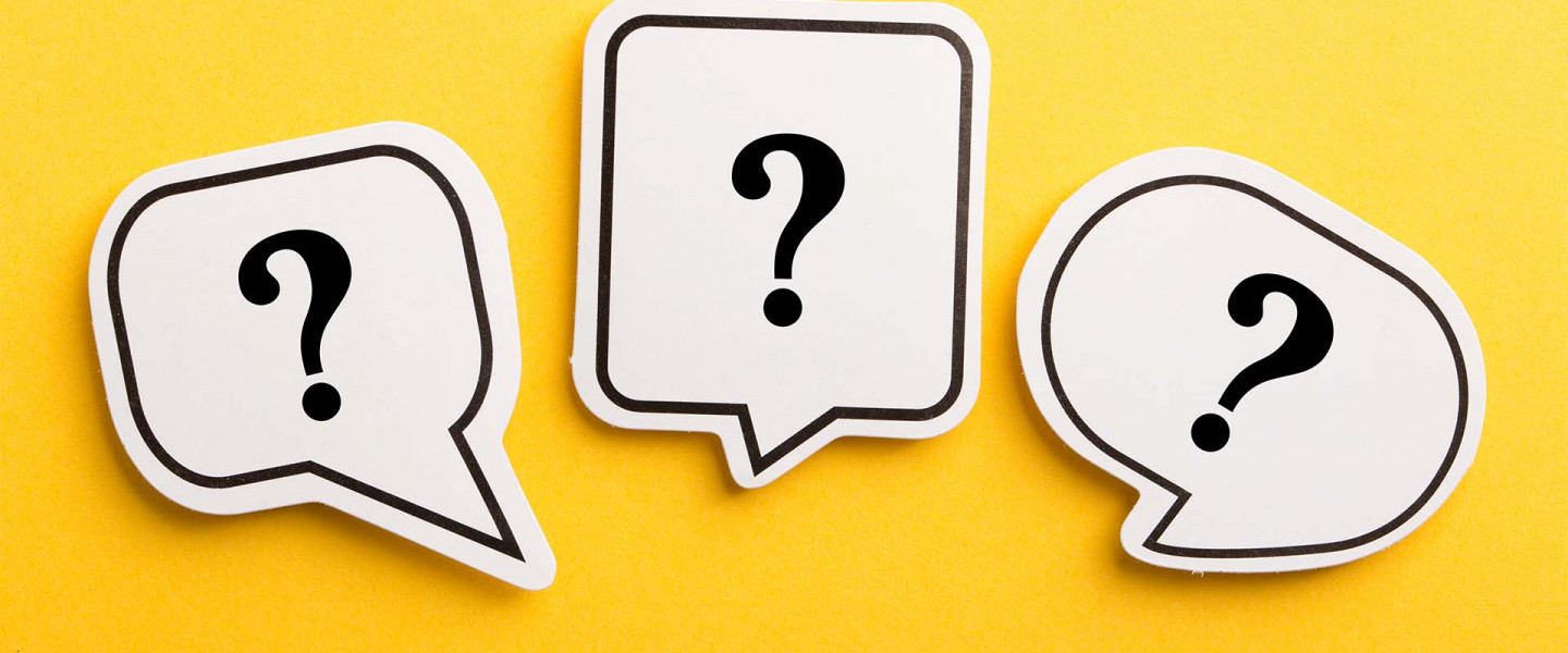 Question marks in speech bubbles